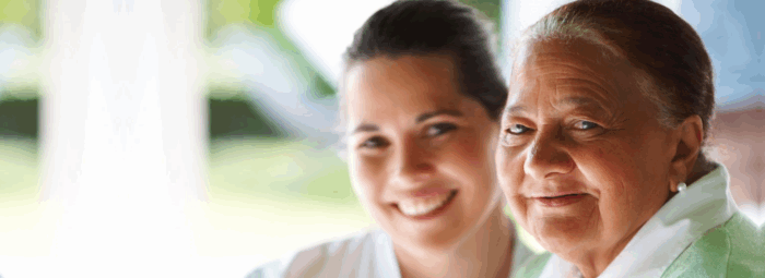 caregiver and patient smiling