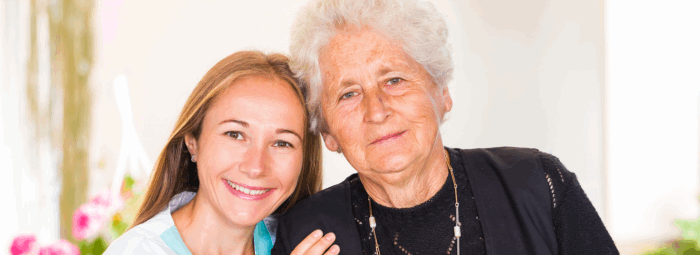 caregiver and patient smiling